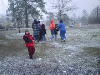 Grandchildren playing in the snow
