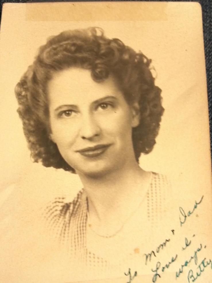 Who is the beautiful woman? My Gran in 1942, her senior photo. photo 463701_420908494591798_202101675_o.jpg