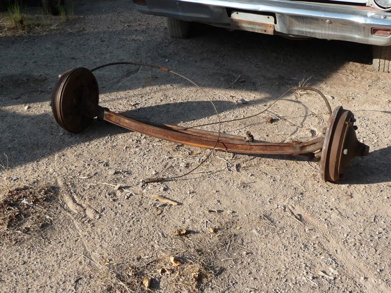 1937 Ford front axle This has the wide 5 hubs and drums with mechanical 