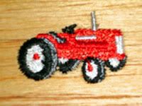 teeny tiny red tractor wooden box
